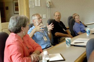 People discussing during meeting