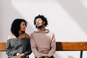couple-talking-sitting-down-happily