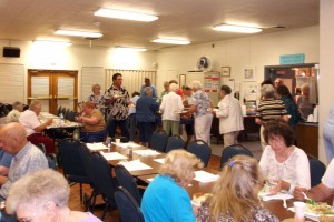 Image credit: Friday Lunch at the PH Senior Center taken by Bill Larkins under Public Domain.