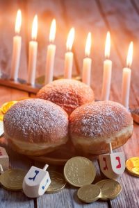Menorah Doughnuts Chockolate Coins and Wooden dreidels