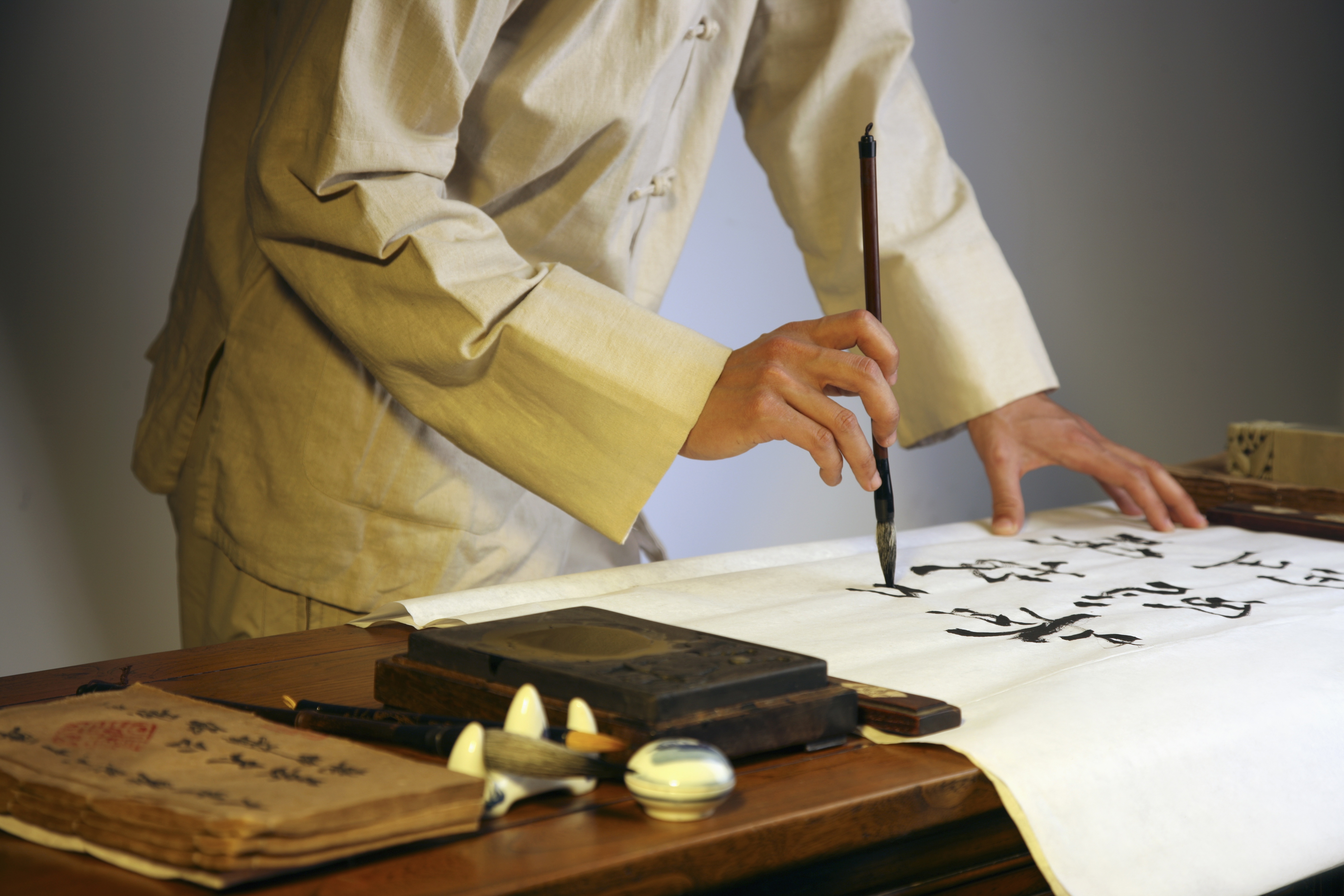 a chinese calligrapher at work