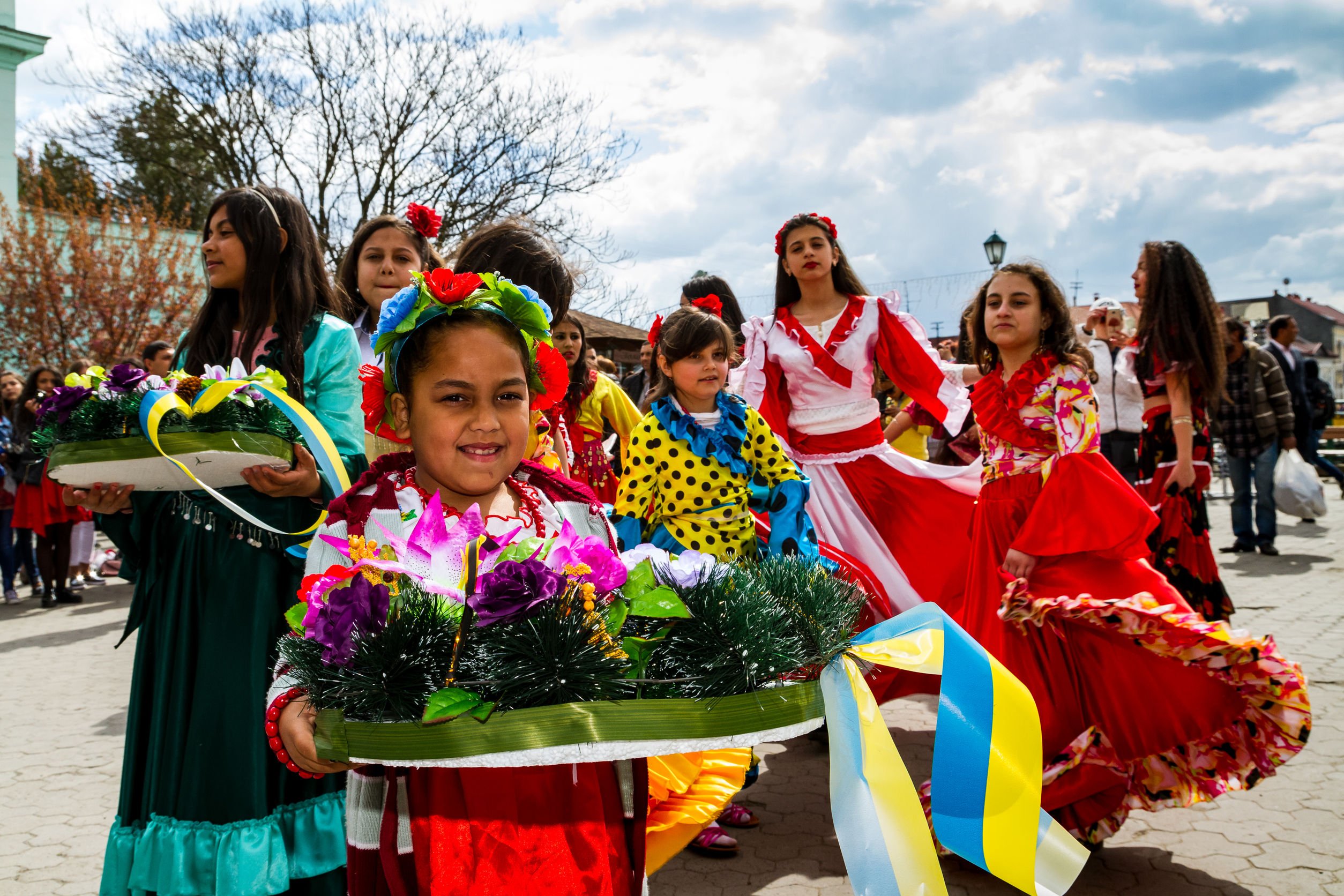 participants of the International Romani Day perform Romany folk dances in the city center