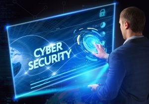 Young businessman working on the smartphone of the future clicks on the virtual display button Cyber Security