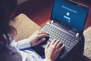 Secure payment message on a laptop screen