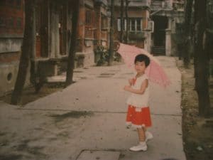 small-chinese-girl-holding-umbrella