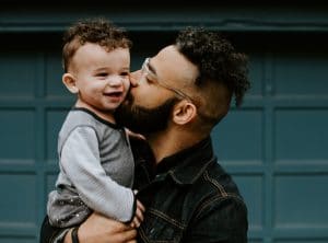 latino man with baby