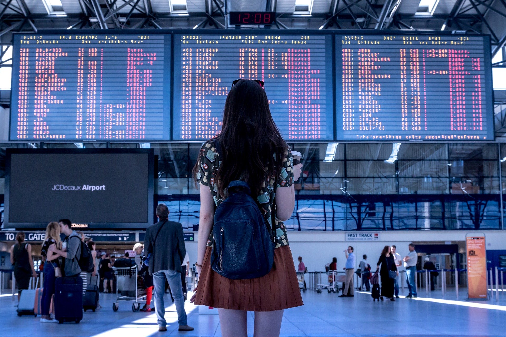 woman-standing-in-airport