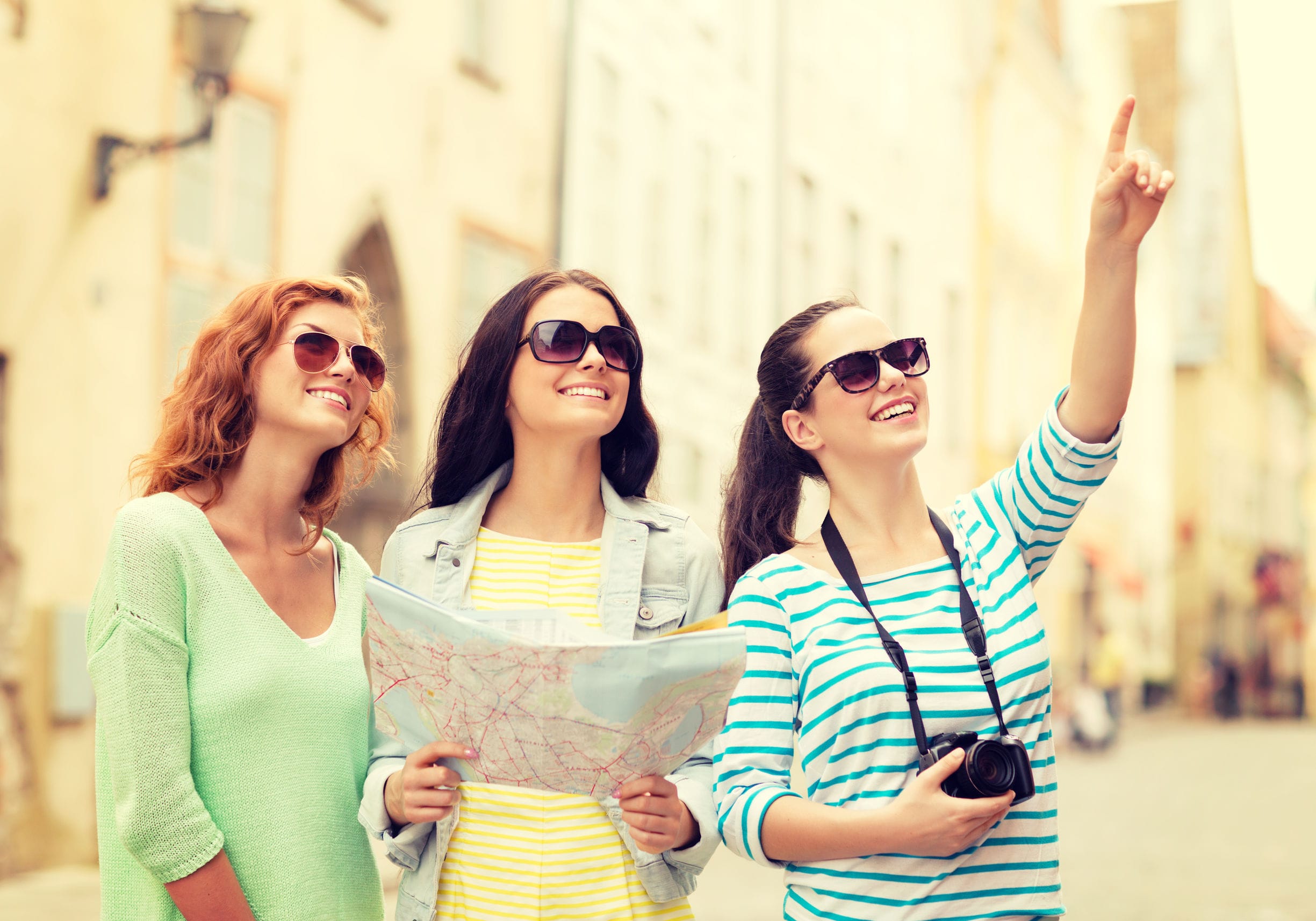 three tourist girls